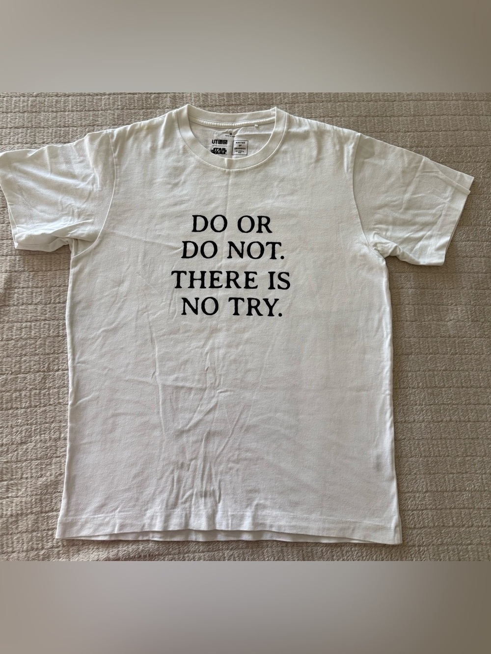 Uniqlo Star Wars White Short Sleeve Tee with Black Motivational Text